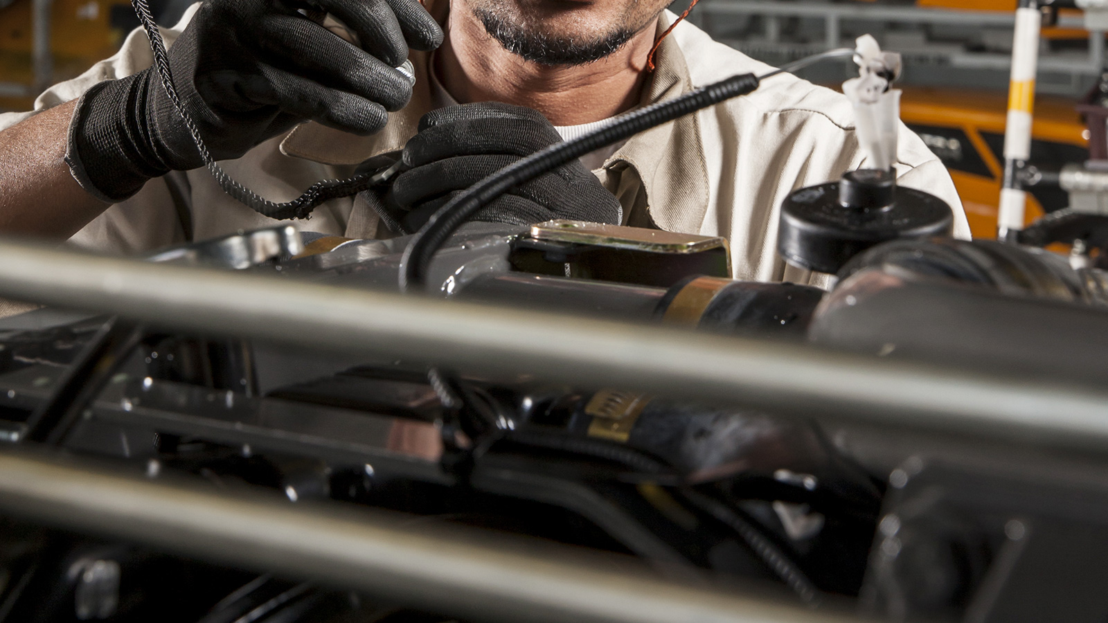 valtra man working on reman